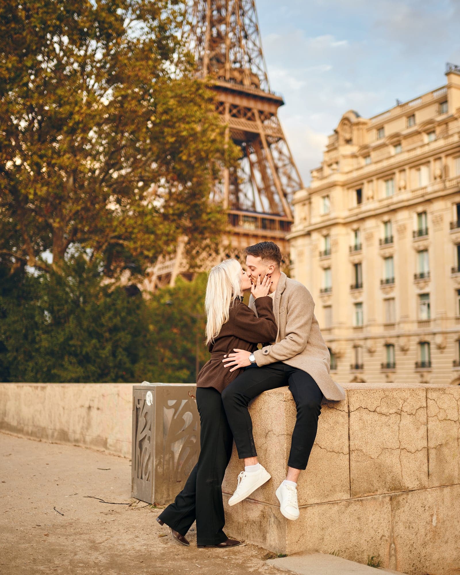 A couple in front of Eiffel Tower
